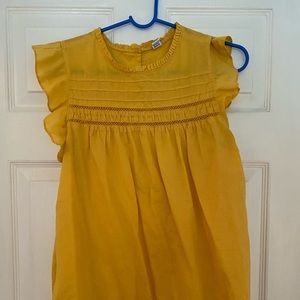 Yellow top. Ruffle sleeves. Size M